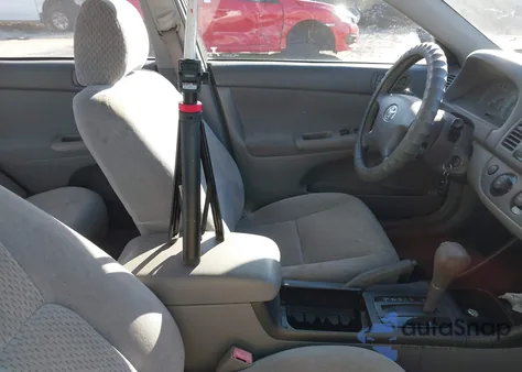 2003 Toyota Camry Le from USA, damaged, VIN 4T1BE32K73U197896